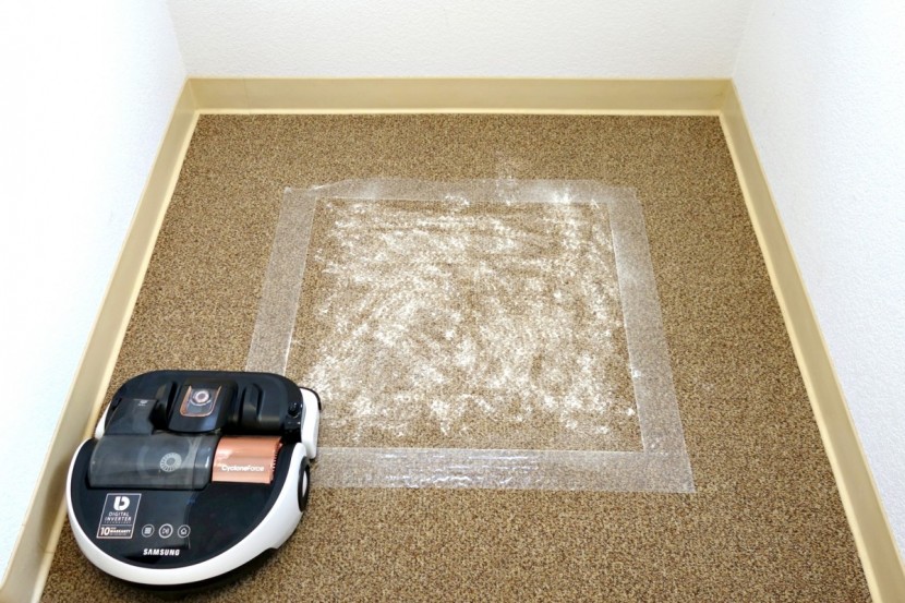 the carpet during the flour cleaning test before the samsung made a...