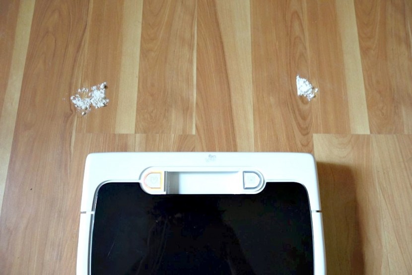 neato botvac d75 - the neato d75 after performing our flour line test. it left behind...