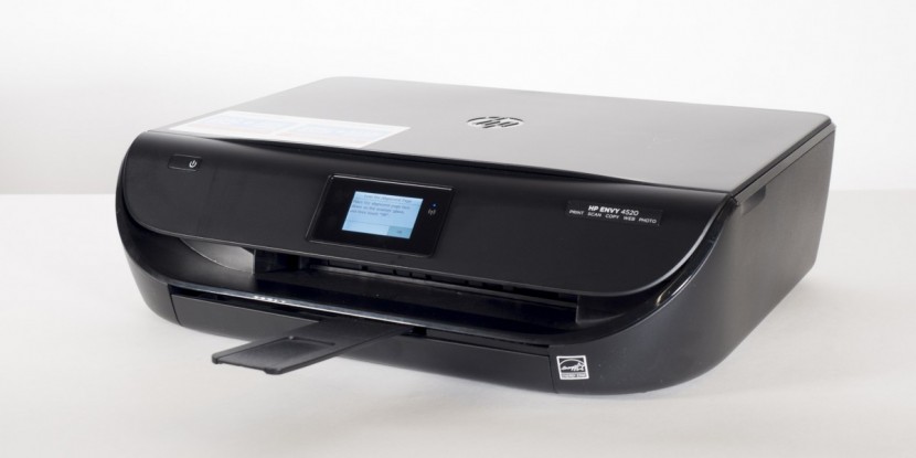 hp envy 4520 - the envy&#039;s print arm stays hidden away then automatically extends...