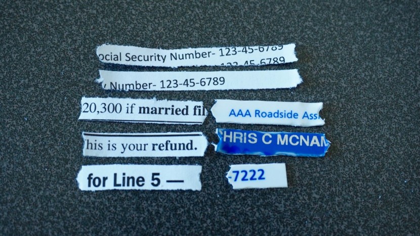 paper shredders - these shreds are from paper fed into the shredding slot with text...