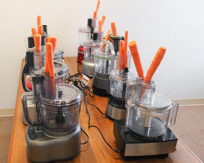 food processor - twenty carrots, ready to be shredded and ranked to see which food...