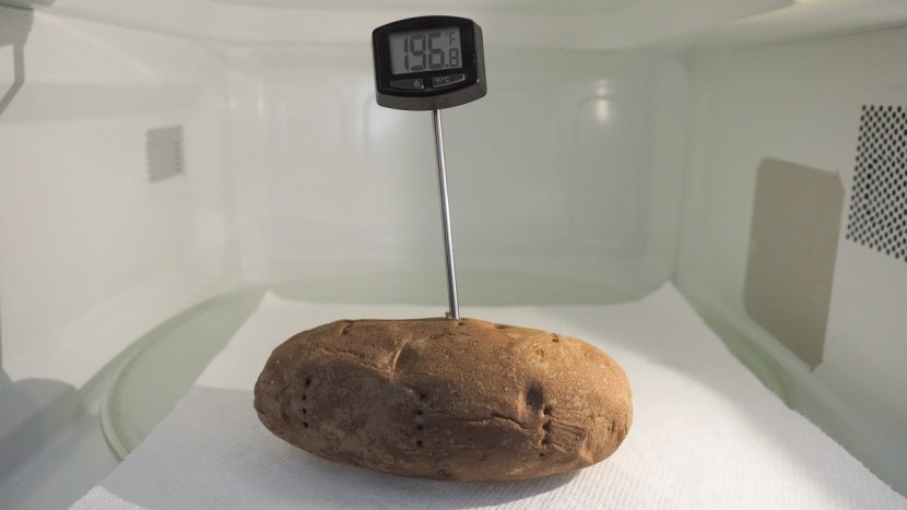 microwave - checking the internal temperature after using the potato preset.