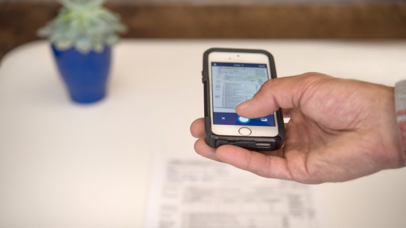 scanner pro app - the process of taking photos of every page does make scanning longer...