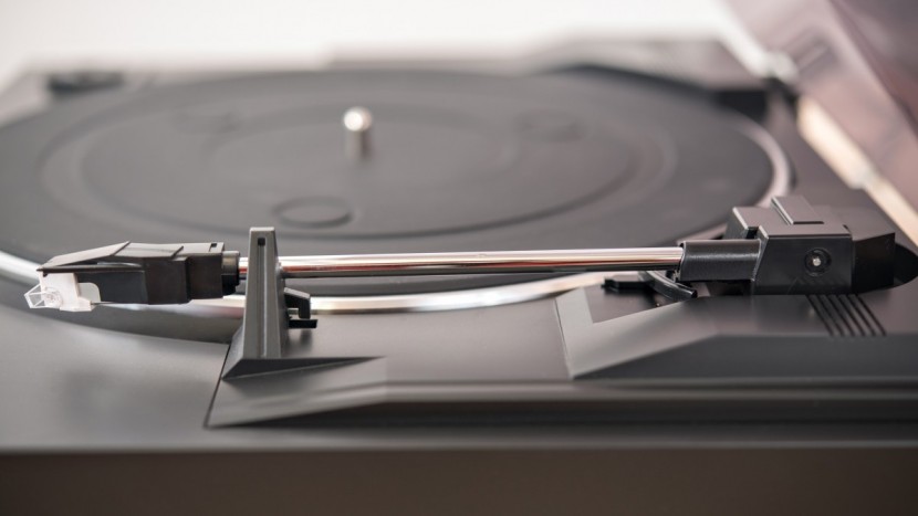 sony pslx300usb - the sony is mostly plastic construction, but the tonearm is metal.