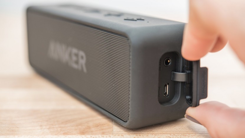 anker soundcore 2 - the soundcore 2&#039;s covered charging and auxiliary cable port.