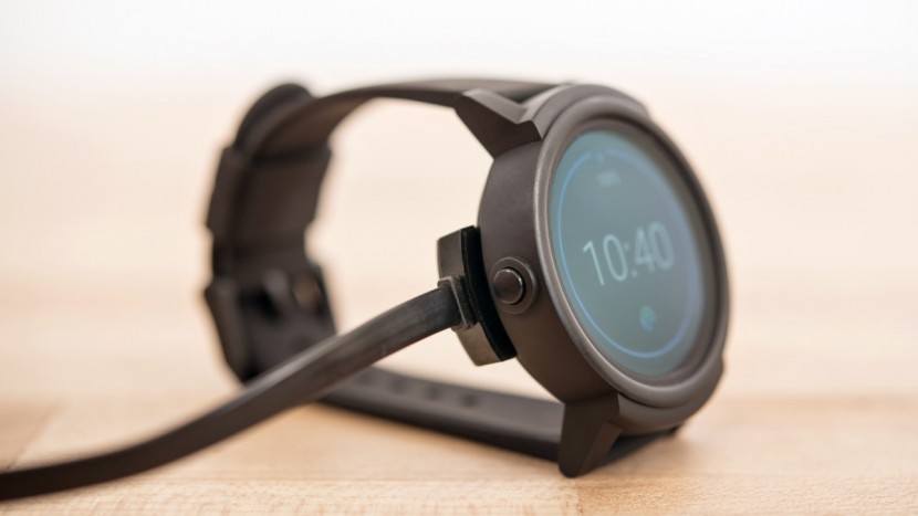 ticwatch e - the magnetically coupled charging cable attaches quite securely.