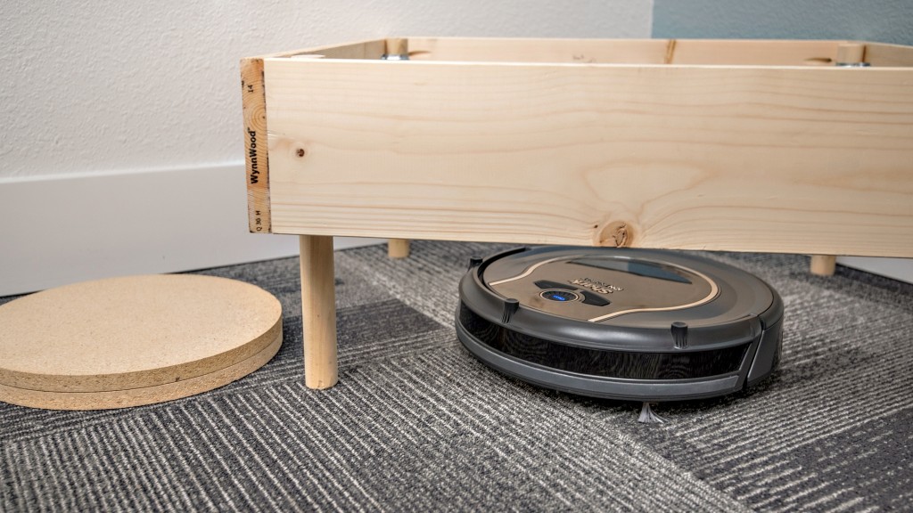 shark ion robot 750 - the shark making quick work under our "comfy chair".