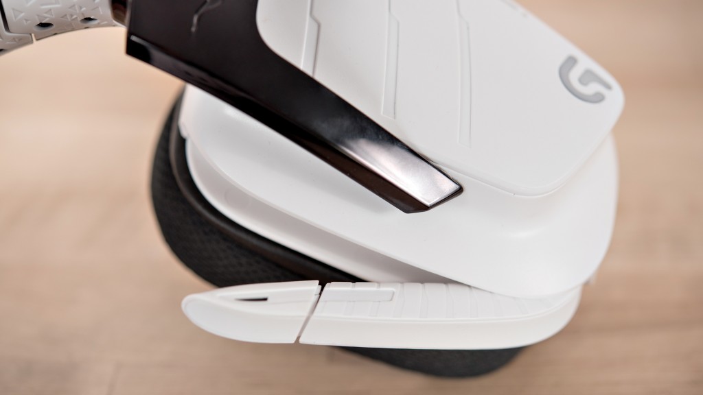 logitech g933 artemis spectrum - the mic can neatly be folded into the ear cup.