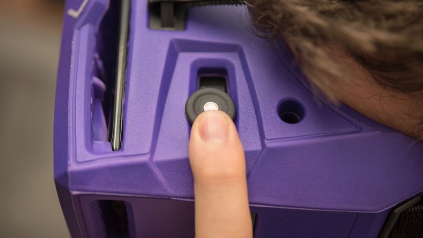 merge vr - a button used to interact with the screen or slide from side to side...