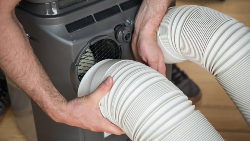 portable air conditioner - dual hose models minimize creating a negative air pressure inside a...