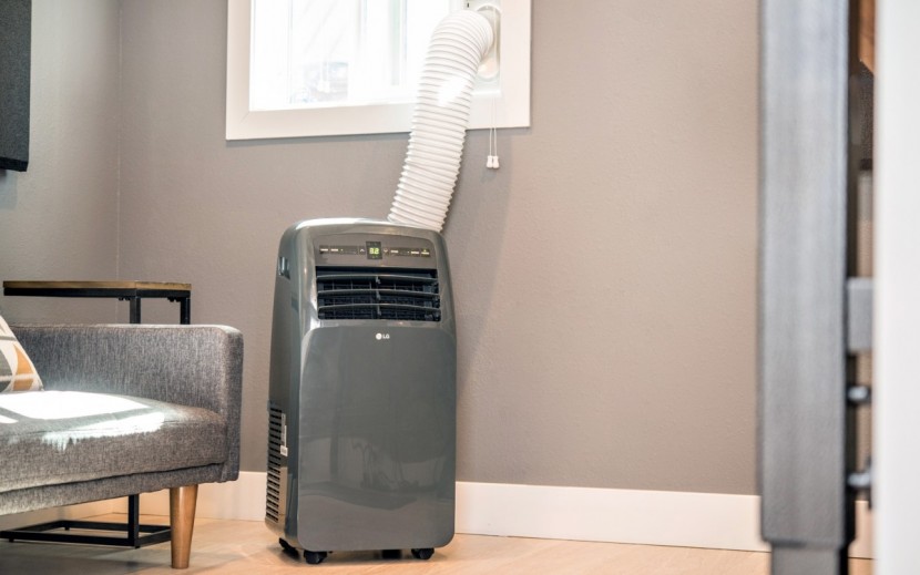 portable air conditioner - the lg lp1215gxr all set up and ready for cooling.