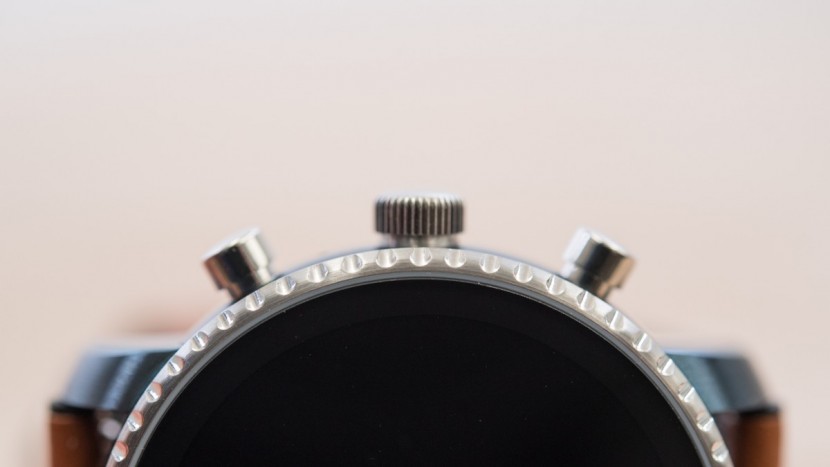 fossil q explorist hr - in addition to the touchscreen, there is a rotating crown and two...