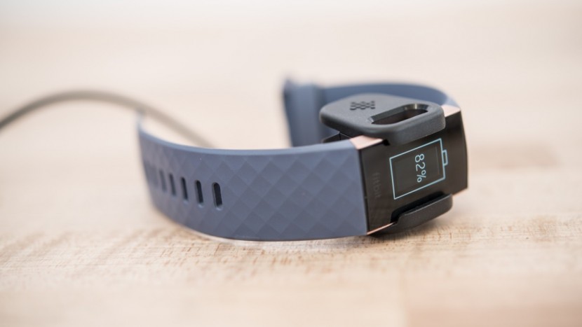 fitbit charge 3 - the charger securely clamps around the charge 3.