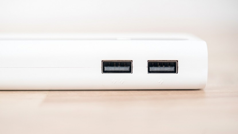 this portable battery can charge two devices at once, albeit very...