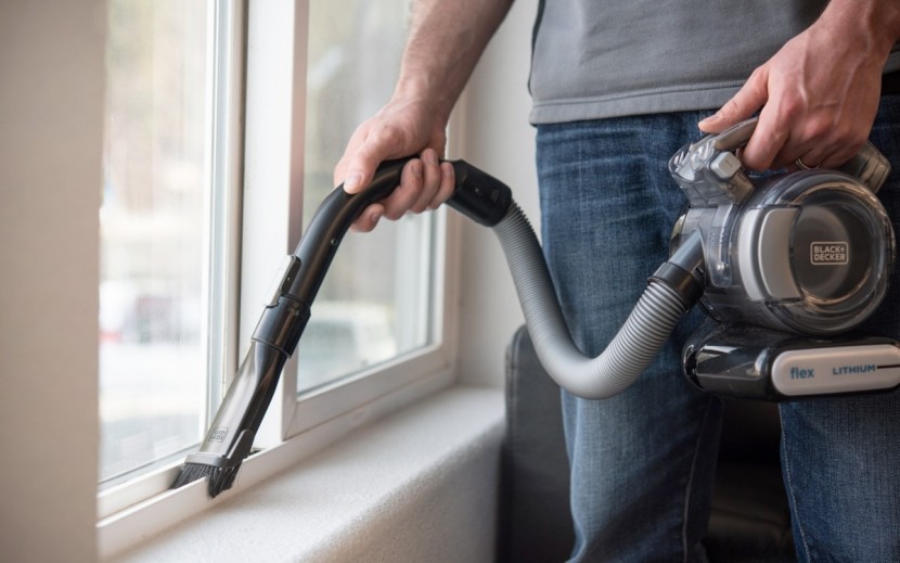 handheld vacuum - the integrated hose on the flex vac requires two-handed operation...