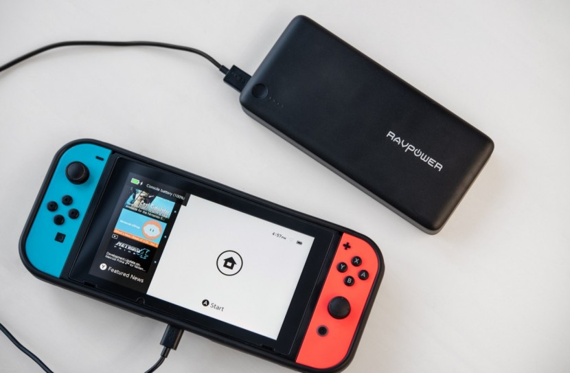ravpower super-c 26800 - the super-c is able to charge a nintendo switch while you are playing.
