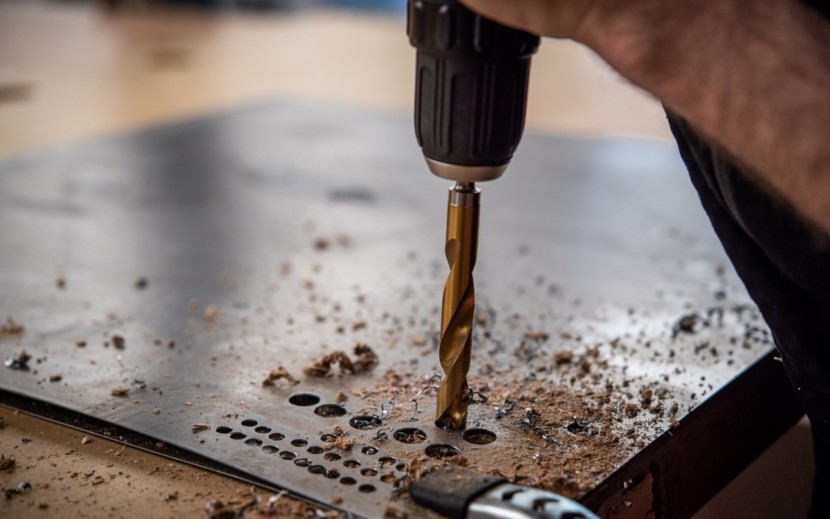 drill - we drilled through a 16 gauge steel sheet.