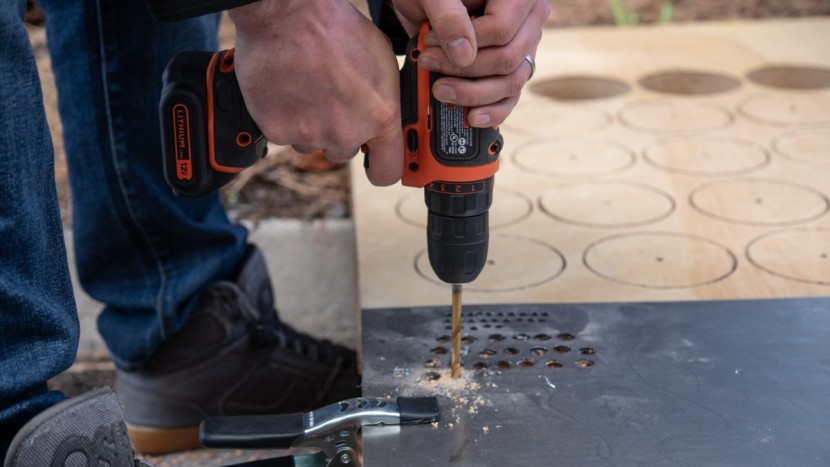 this black+decker drilled a few holes in the steel sheet but it...