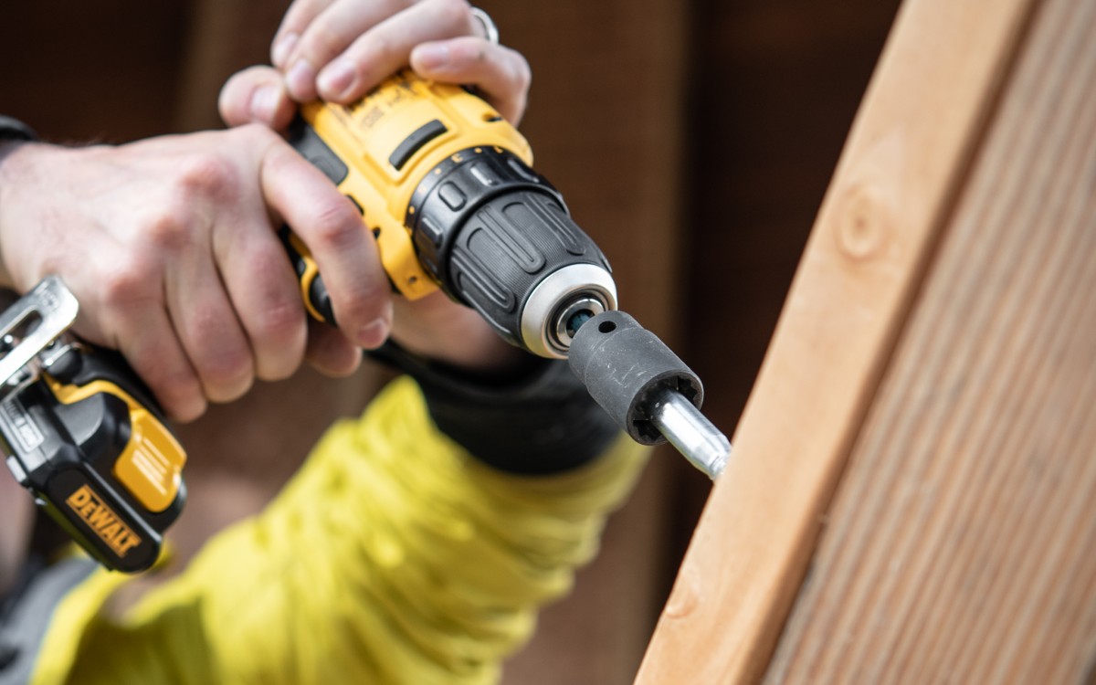 DeWalt 12V Max 3/8 In. Drill Driver Kit DCD710S2 Review (The DeWalt DCD710S2 (12-volt) hard at work driving in a lag screw.)