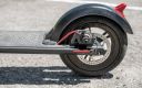 electric scooter - the gotrax gxl's rear disk brake offers reliable and consistent...
