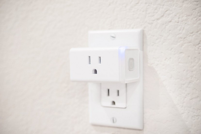 tp-link kasa wifi lite - this small plug barely impedes the second outlet.