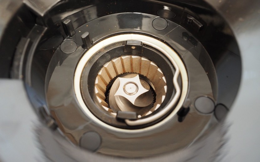 coffee grinder - burr models crush the coffee beans in the gap between two spinning...