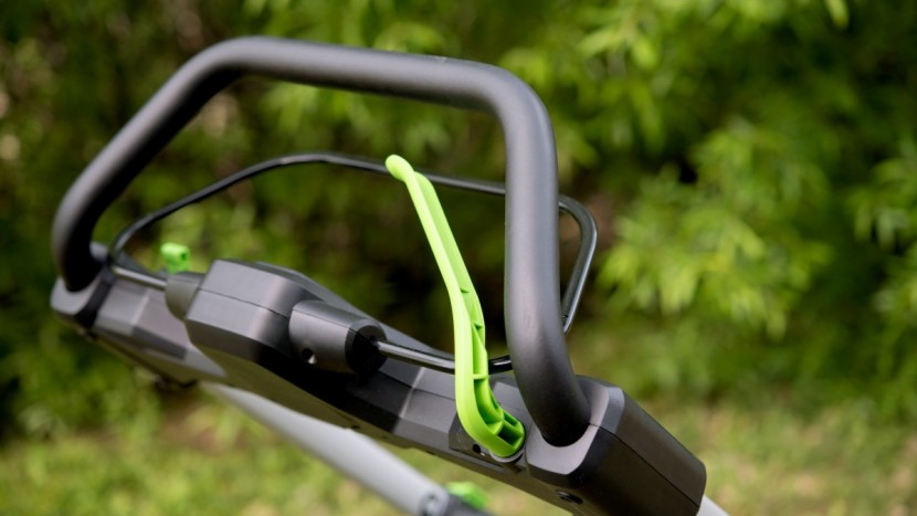 ego power+ lm2102sp - the ego&#039;s self-propel trigger (green) and bail (black), both are...