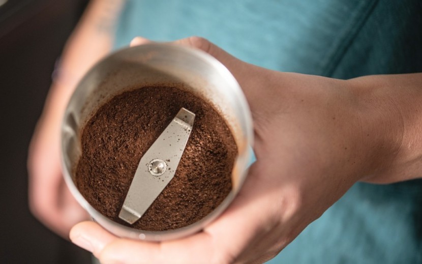 coffee grinder - blade models spin a blade through a chamber full of beans, resulting...