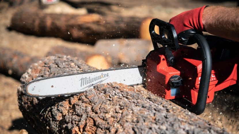 chainsaw - the milwaukee cordless electric model has a lightning-fast wind-up...