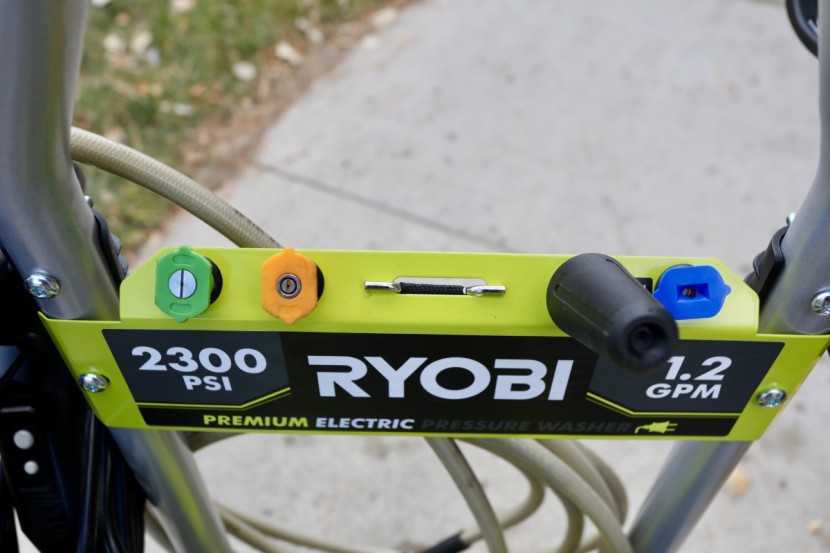 ryobi ry142300 - the included nozzles fit in a handy storage area at the top of the...