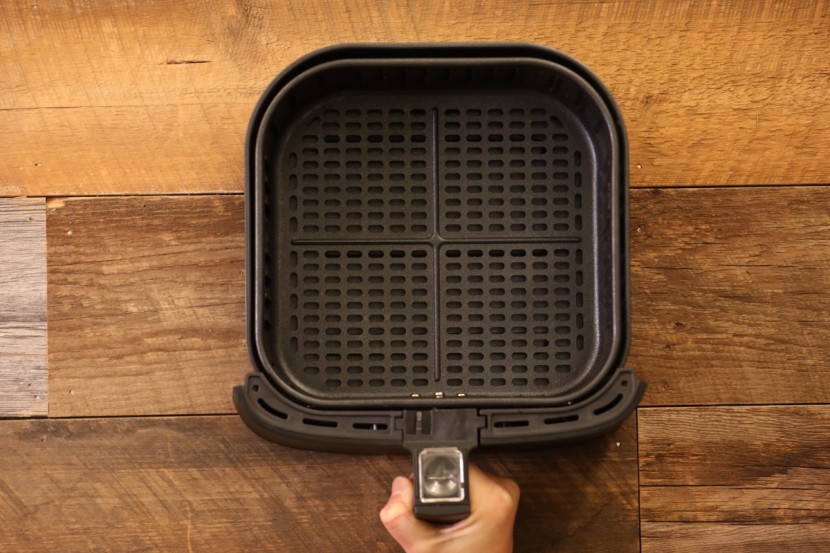 cosori smart air fryer oven - the fry basket is large and relatively easy to clean, but it can be...