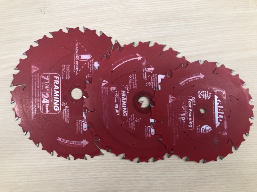 cordless circular saw - from left to right: 7 1/4, 6 1/2 and 5 1/2 inch blades that define...