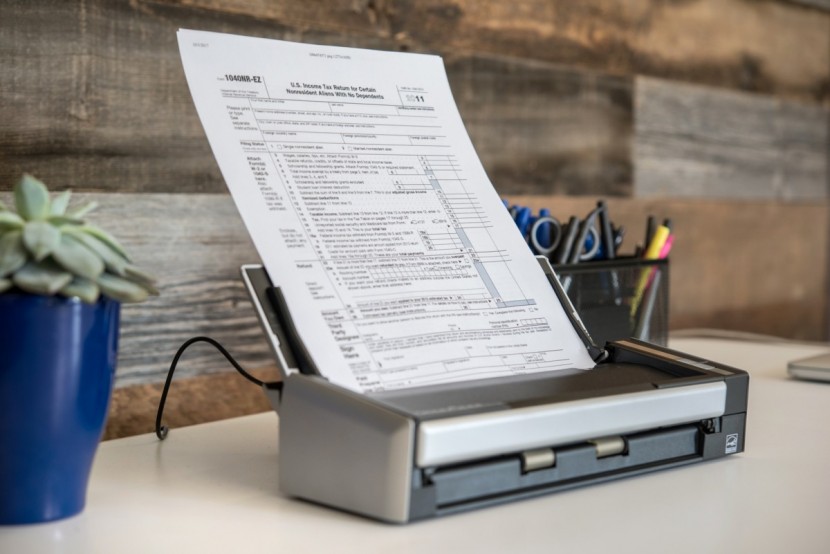 fujitsu scansnap s1300i - the s1300i is relatively slow when compared to other high end models.