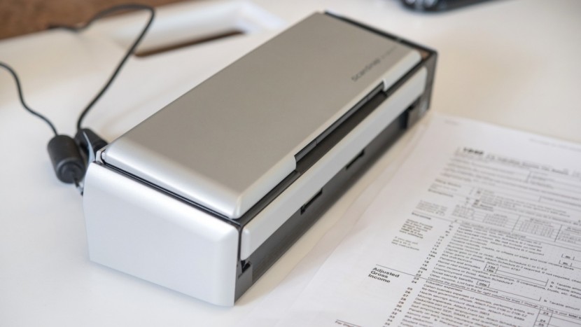 scanner - small, portable models like the fujitsu scansnap s1300i are great...