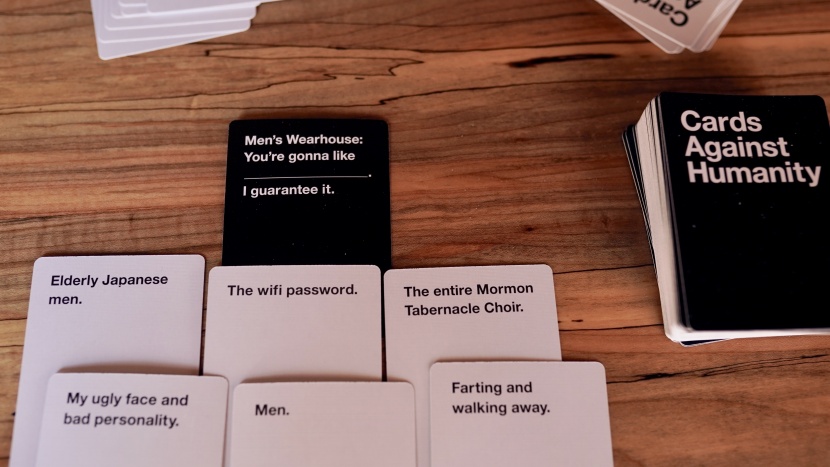 card game - cards against humanity is a polarizing game due to its blatant...
