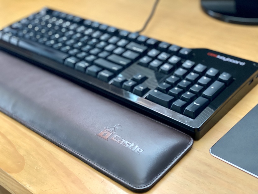 wrist rest - the castle bailey keyboard rest has a durable leather covering.