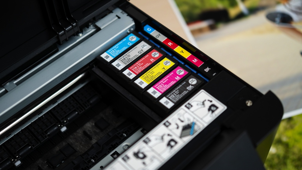 photo printer - the expression uses dye-sublimation ink in cyan, gray, red, yellow...