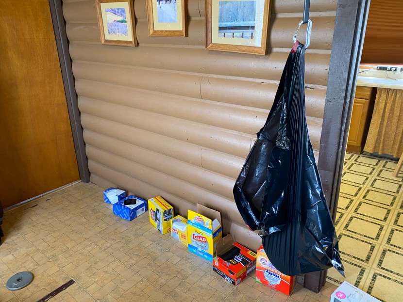 trash bag - the amazon basics 30 gallon bag undergoing strength testing. it did...