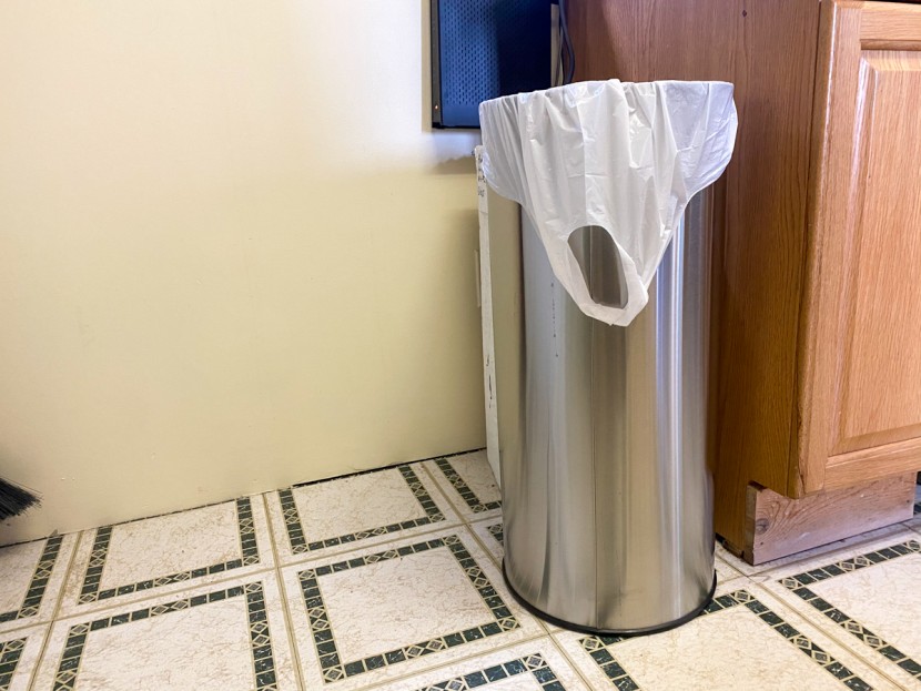 trash bag - the glad handle tie in use. you can readily see the built-in handles.