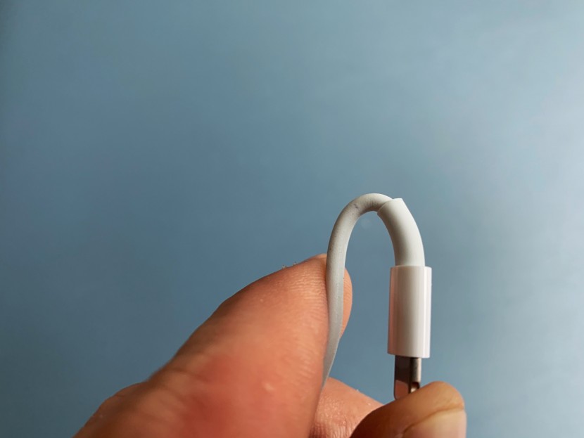 lightning cable - checking cable durability on the apple model - shown after repeated...