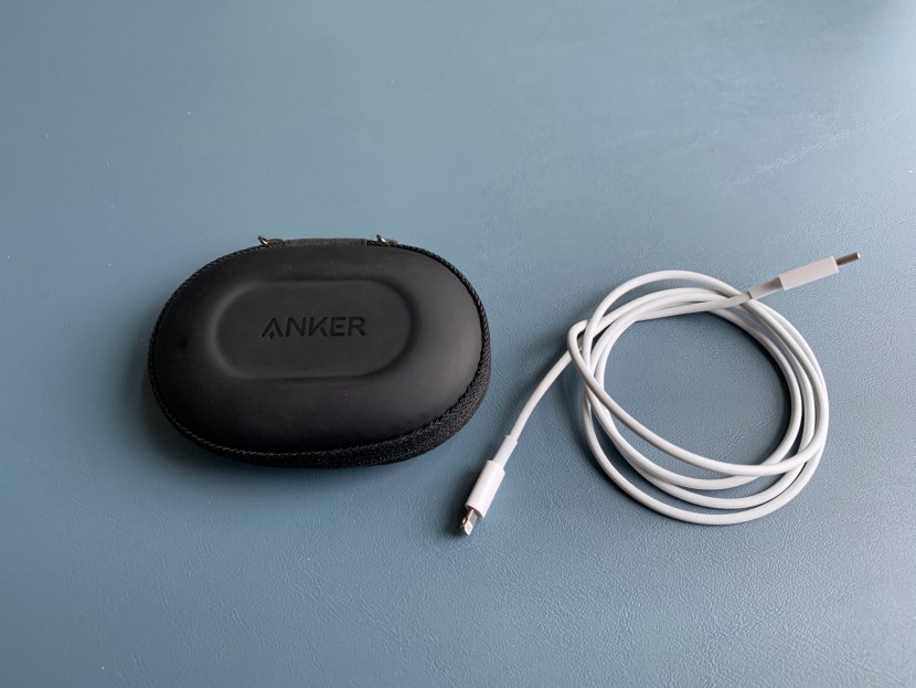 lightning cable - the three-foot anker+ii powerline in its carrying case, next to the...