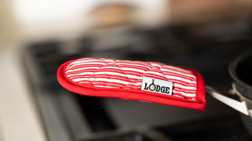 pot holders - the striped hot handle sleeve is best suited to lower heat stovetop...