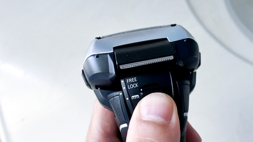 electric razor - a well-labeled slider like the one on the panasonic arc5 electric...