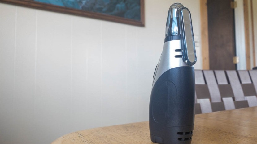 nose hair trimmer - the panasonic 430 showing its vacuum mechanism vents. the oval...