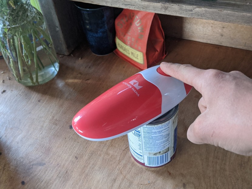 can opener - the kitchen mama literally takes one finger to operate.