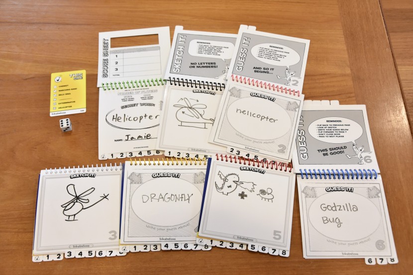 board game - in this example round, the first player was assigned the word...