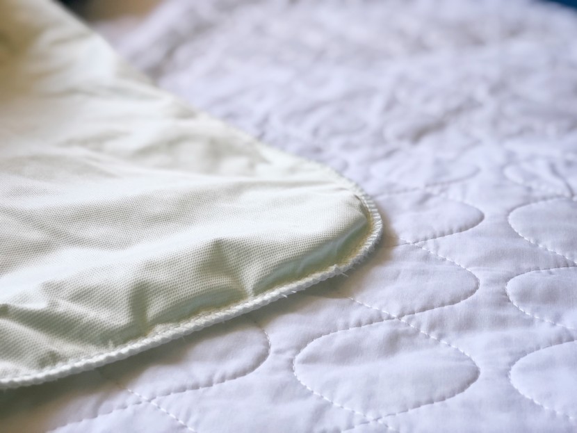 mattress protector - the absorbent priva pads are backed with vinyl, making them sturdier...