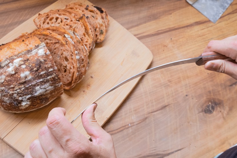 bread knife - thinner blades bend and flex for more control and easier slicing...