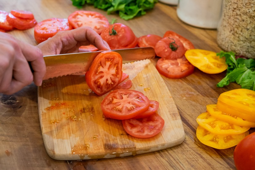bread knife - any knife can cut the first few tomato slices but a sharp blade will...