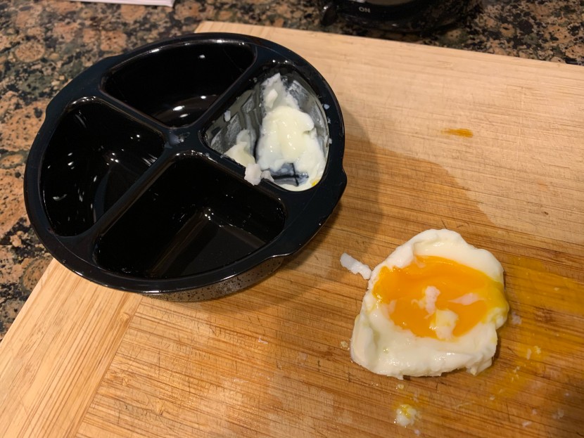 egg cooker - a poached egg getting stuck in the deep dishes of the cuisinart...